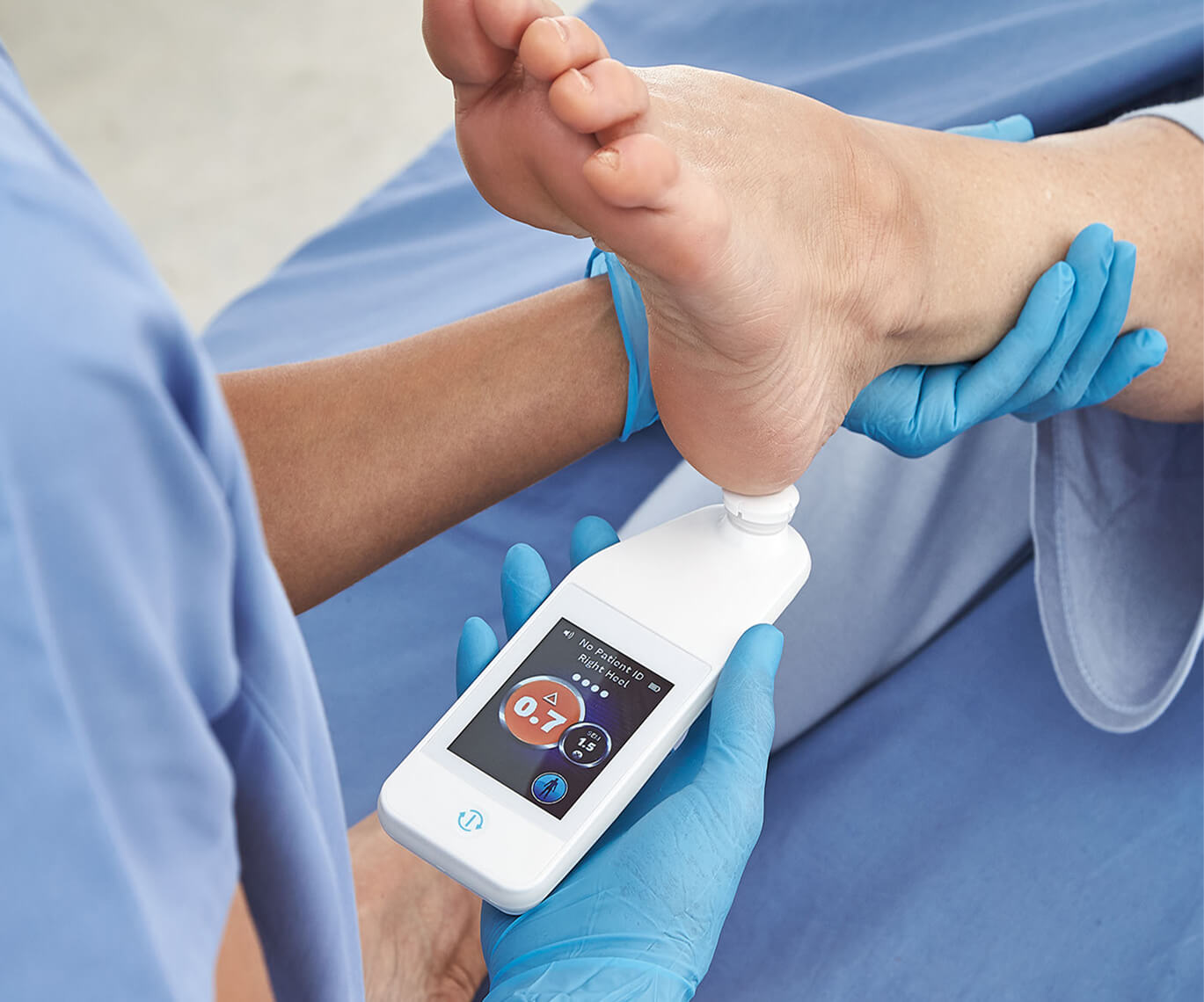 provizio scanner on heel with screen showing readings